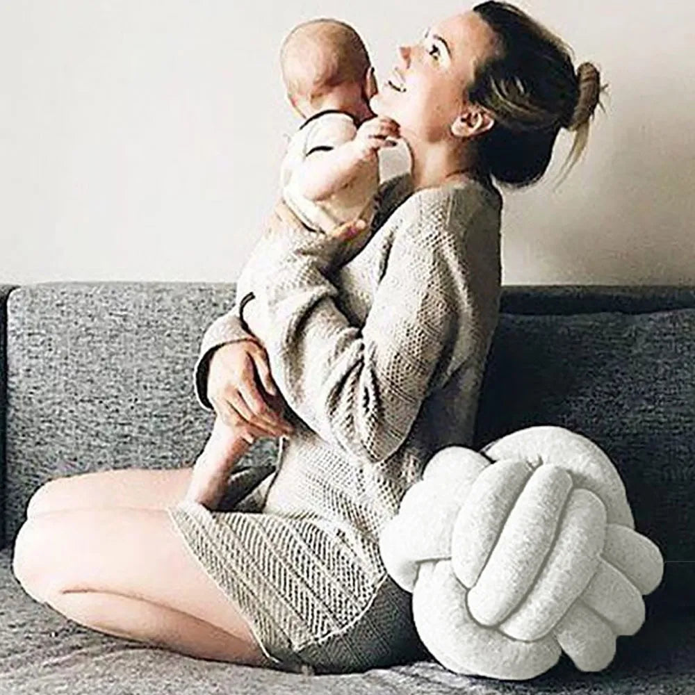 Coussin rond noué en velours pour enfant
