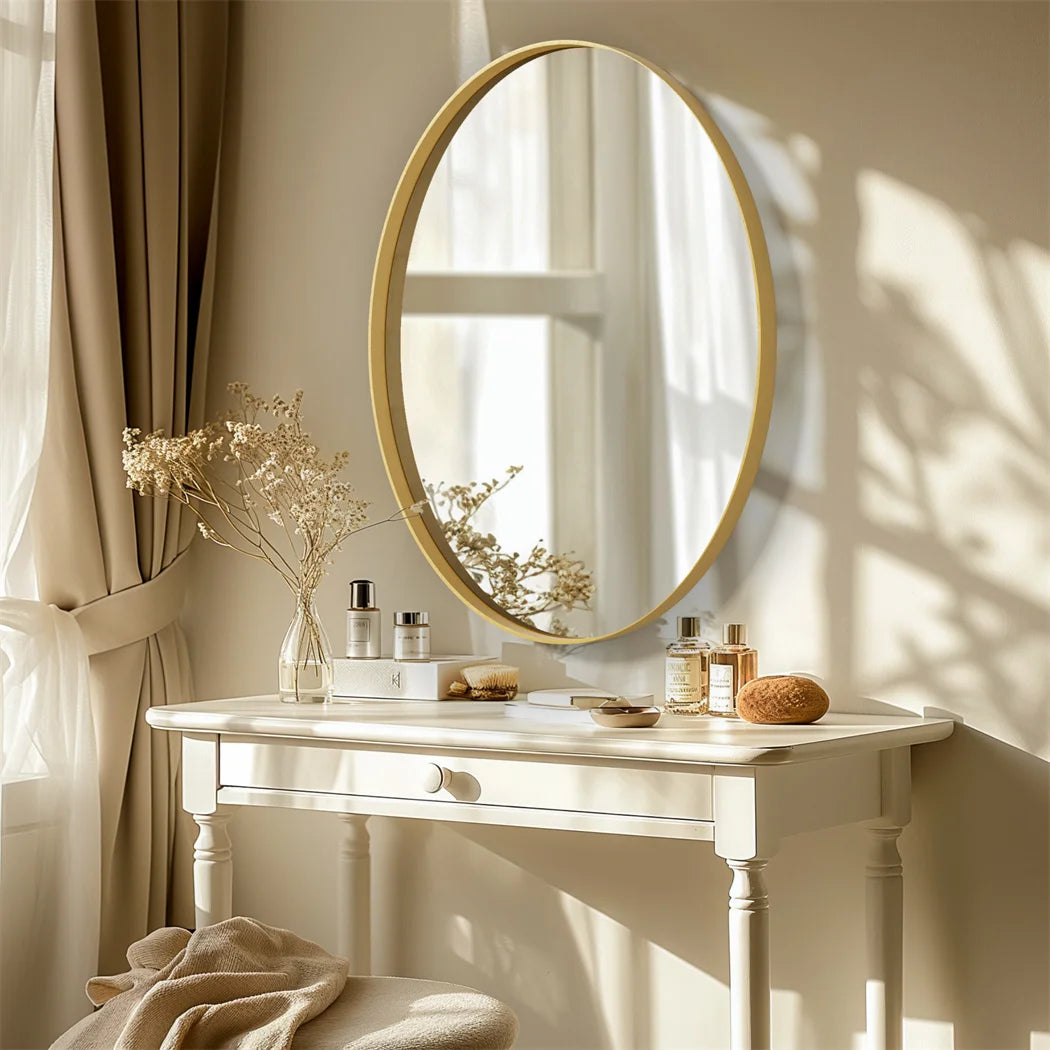 Miroir en or brossé avec cadre en métal